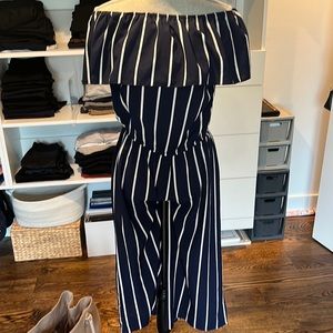 Women’s navy and white stripe jumpsuit off the shoulder